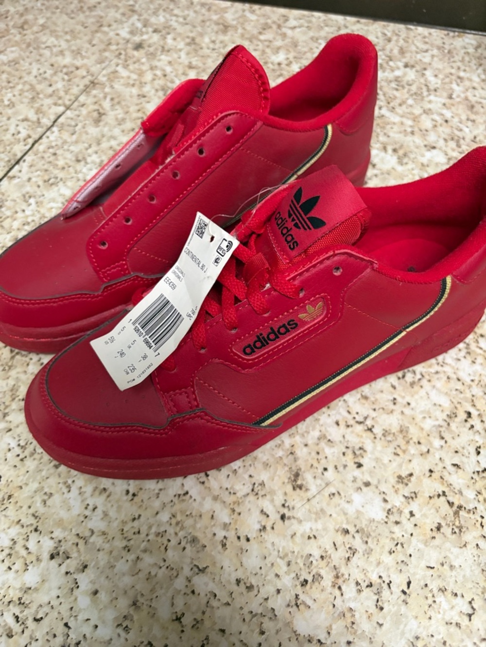 adidas Red Low-Top Sneakers with Subtle Gold Trim